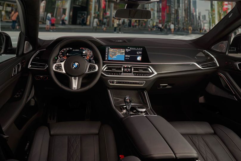 The X6 has giant display screens in a cabin that’s more luxurious than before.